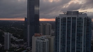 AX0022_059 - 5K aerial stock footage flyby Four Seasons Hotel and Jade at Brickell Bay in Downtown Miami at sunset, Florida