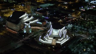 AX0023_138E - 5K aerial stock footage approach Adrienne Arsht Center for the Performing Arts at night in Downtown Miami, Florida