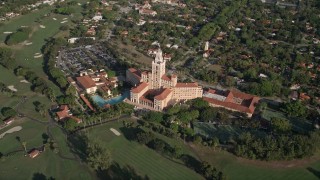 AX0024_020 - 5K aerial stock footage of flying by the Coral Gables Biltmore Hotel, Coral Gables, Florida
