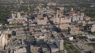 AX0024_022E - 5K aerial stock footage of flying by office buildings, Coral Gables, Florida