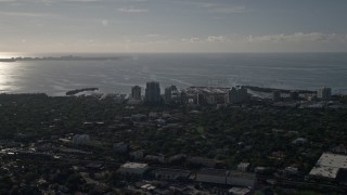 AX0024_024 - 5K aerial stock footage of flying by coastal hotels, apartment buildings in Coconut Grove, Florida