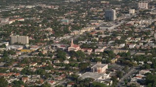 AX0024_027 - 5K aerial stock footage of flying by a church and homes in Coral Way, Florida