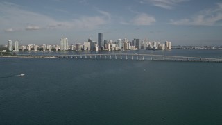 AX0024_051 - 5K aerial stock footage of the Rickenbacker Causeway, Downtown Miami, and Biscayne Bay, Florida