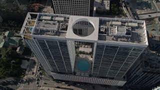 AX0024_059 - 5K aerial stock footage approach 500 Brickell West Tower, tilt to bird's eye view, Downtown Miami, Florida