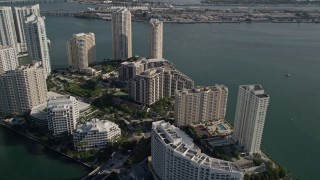 AX0024_061E - 5K aerial stock footage fly over Mandarin Oriental to Brickell Key condos, Downtown Miami, Florida