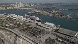 AX0024_063 - 5K aerial stock footage approach and flyby Disney cruise ship docked at Port of Miami, Miami, Florida