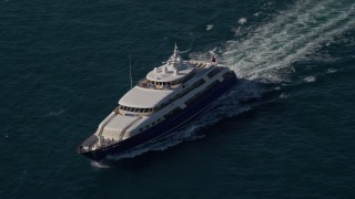 AX0024_111 - 5K aerial stock footage of flying by a Yacht, Atlantic Ocean, Miami, Florida