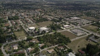 AX0025_007 - 5K aerial stock footage of approaching the Upper Room Assembly, South Miami Heights, Florida