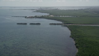 AX0025_017 - 5K aerial stock footage of Mangrove Preserve, Homestead Bayfront Park, Turkey Point Power Plant, Homestead, Florida