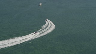 AX0025_060 - 5K aerial stock footage of fishing boats on Blackwater Sound, Key Largo, Florida