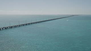 AX0025_143 - 5K stock footage aerial video of flying by Overseas Highway, approaching Conch Key, Marathon, Florida