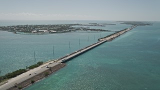 AX0025_149 - 5K stock footage aerial video of following Overseas Highway by Duck Key, Marathon, Florida