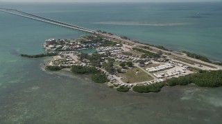 AX0026_013 - 5K stock footage aerial video of approaching Hawk's Nest Marathon, RV Park, Knight's Key, Marathon, Florida