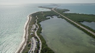 AX0026_035 - 5K aerial stock footage of flying over Bahai Honda State Park, approaching the beach, Bahai Honda Key, Florida