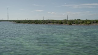 AX0026_041 - 5K aerial stock footage of flying by the coast of Spanish Harbor Key, Florida
