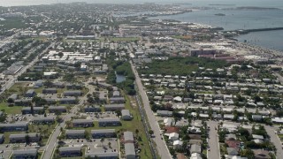 AX0026_061 - 5K aerial stock footage of flying over neighborhood, revealing Poinciana Mobile Home Park, Key West, Florida