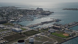 AX0026_066 - 5K aerial stock footage of flying over Trumbo Point, with a view of a cruise ship in Key West, Florida