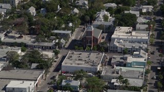 AX0026_080 - 5K aerial stock footage of flying by Key West Chamber of Commerce, Key West, Florida