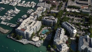 AX0026_081 - 5K aerial stock footage of flying over Pier House Resort and Caribbean Spa, Key West, Florida