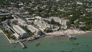 AX0026_114 - 5K aerial stock footage of The Reach - A Waldorf Astoria Resort on the shore of Key West, Florida