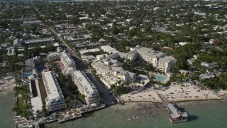 AX0027_009 - 5K aerial stock footage of flying by The Reach, A Waldorf Astoria Resort, Key West, Florida