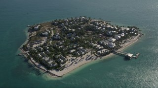 AX0027_016 - 5K aerial stock footage of approaching homes on Sunset Key, Key West, Florida