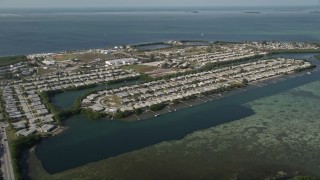 AX0027_028 - 5K stock footage aerial video of flying by Sigsbee Park, Key West, Florida