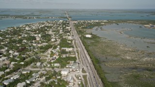 AX0027_041 - 5K aerial stock footage of flying over Overseas Highway, revealing Big Coppitt Key, Florida