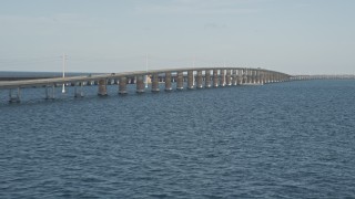 AX0027_080 - 5K aerial stock footage of flying by a rise in Seven Mile Bridge, Florida