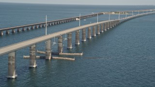 AX0027_081 - 5K aerial stock footage of ascending next to a rise in Seven Mile Bridge, Florida