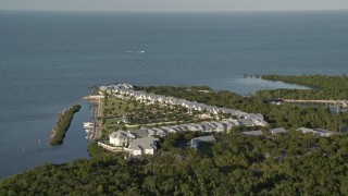 AX0028_002 - 5K aerial stock footage of flying by Indigo Reef Vacation Rentals on the shore, Marathon, Florida