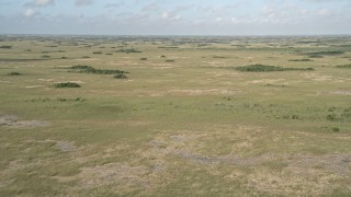 AX0030_035 - 5K aerial stock footage of a view of marshland, Florida Everglades, Florida