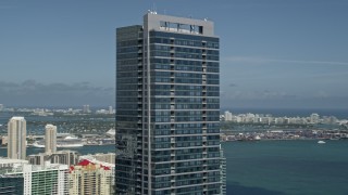 AX0031_033 - 5K aerial stock footage of the top of Four Seasons Hotel Miami, Downtown Miami, Florida