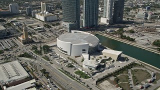 AX0031_039 - 5K aerial stock footage of approaching American Airlines Arena, Downtown Miami, Florida
