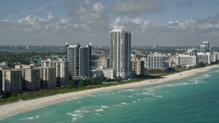 AX0031_063 - 5K aerial stock footage of approaching Akoya Miami Beach Condo, Miami Beach, Florida
