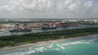 AX0031_100 - 5K aerial stock footage of cargo ships, Port Everglades, Fort Lauderdale, Florida