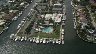 AX0031_111 - 5K aerial stock footage of the Lauderdale Yacht Club, Fort Lauderdale, Florida