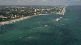 AX0031_154 - 5K aerial stock footage of kite surfers off the coast, Pompano Beach, Florida