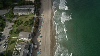 AX0032_008 - 5K stock footage aerial video of flying over homes on the beach, Hillsboro Beach, Florida