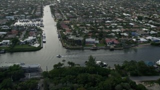 AX0032_012 - 5K aerial stock footage fly by mansions, neighborhoods, Intracoastal Waterway, Lighthouse Point, Florida