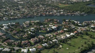 AX0032_026 - 5K aerial stock footage of an upscale residential neighborhood, Boca Raton, Florida
