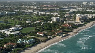 AX0032_048 - 5K aerial stock footage of flying by mansions on the coast, Gulf Stream, Florida