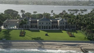 AX0032_072 - 5K aerial stock footage of a mansion on the coast, Palm Beach, Florida