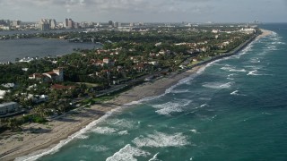 AX0032_075 - 5K stock footage aerial video of following the coast past upscale residential neighborhoods, Palm Beach, Florida