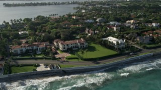 AX0032_077 - 5K aerial stock footage of flying by coastal mansions, Palm Beach, Florida