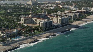 AX0032_080 - 5K aerial stock footage of approaching The Breakers Palm Beach hotel in Palm Beach, Florida