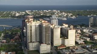 AX0032_088 - 5K aerial stock footage of flying by apartment buildings, West Palm Beach, Florida
