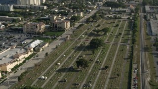 AX0032_089 - 5K aerial stock footage of approaching Woodlawn Cemetery, West Palm Beach, Florida