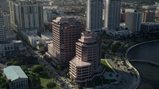 AX0032_093 - 5K aerial stock footage of waterfront office buildings, West Palm Beach, Florida