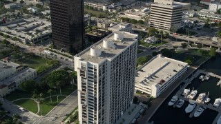 AX0032_094 - 5K aerial stock footage of approaching an apartment building in West Palm Beach, Florida